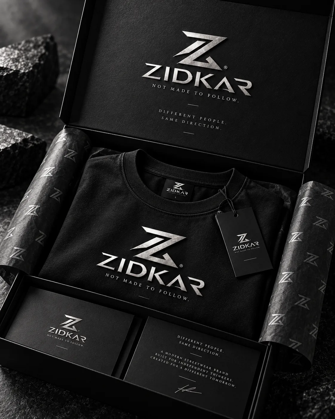 Open ZIDKAR box with folded T-shirt and hang tag